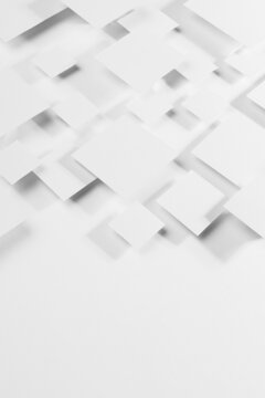 White geometric texture with flying rhombuses as pattern in sunlight with soft gradient grey shadows as border, copy space, top view, vertical. Simple abstract background in minimal style. © finepoints