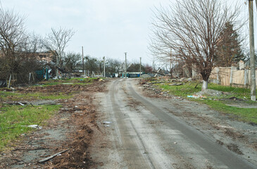 The war in Ukraine, the view of the village affected by the explosions, the road in the destroyed...