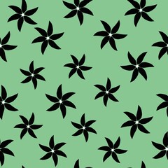 Simple vintage pattern. black flowers. green background. fashionable print for textiles, wallpaper and packaging.