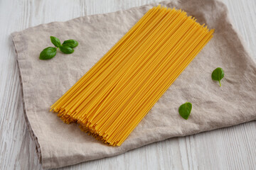 Raw Organic Spaghetti Pasta in a Bunch, side view. Close-up.