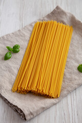 Raw Organic Spaghetti Pasta in a Bunch, low angle view.