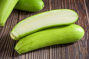 zucchini or marrow on wooden table with clipping path