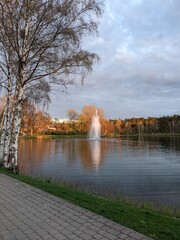  fountain in the middle of the lake in sunny spring afternoon