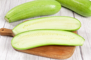 zucchini on wooden table with clipping path