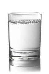 Glass full with water on a white