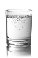 Glass full with water on a white