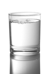 Glass full with water on a white