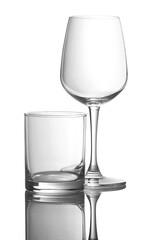 Empty wine glass on a white