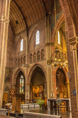 Fototapeta na wymiar Alkmaar, Netherlands, May 2022. The interior of a church with religious artifacts.