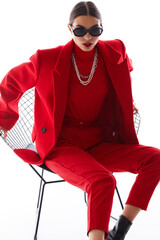 Fashion woman in trendy red outfit.