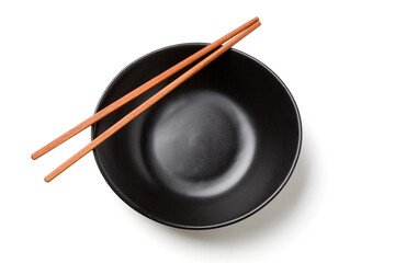 wooden chopsticks on a black bowl