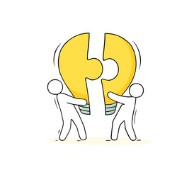 people and light bulb shaped puzzle
