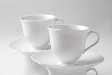 Stacking of empty coffee mugs