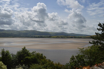 Port Meirion flat sand beach with water