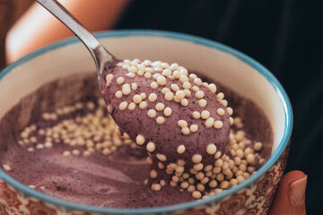 Berry smoothie and protein crunch with chocolate