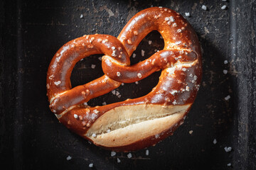 Delicious and salty pretzels with salt freshly baked at home.