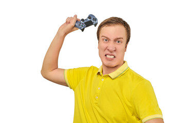 Angry gamer with wireless gamepad dressed in yellow T-shirt isolated on white background © TRAVELARIUM