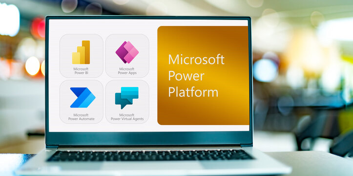 Laptop computer displaying icons of Microsoft Power Platform