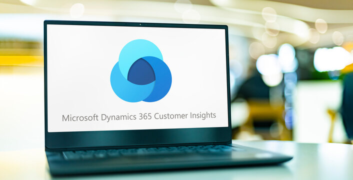 Computer with logo of Microsoft Dynamics 365 Customer Insights