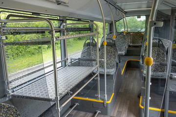 Inside London Stansted airport bus service. Empty seats and luggage rack