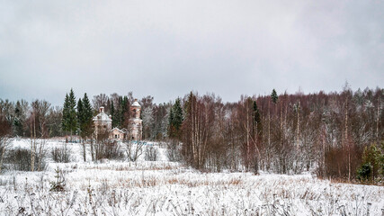 winter landscape old Church in the distance
