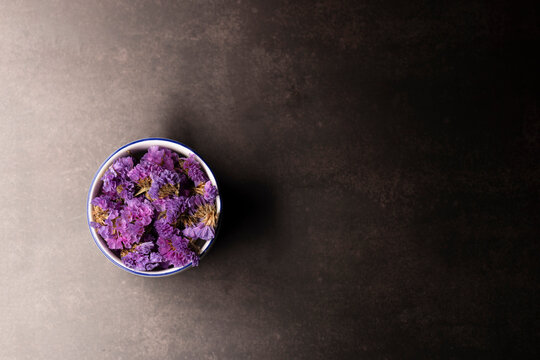 Blue Dried Flowers In A Coffee Cup