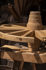manufacturing   of a historical old wooden wheel  CARRIAGE WHEEL