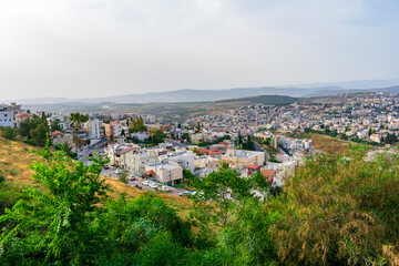 Fototapeta na wymiar Nazareth, Israel - June 4 2019: Panorama of Nazareth, the town of Jesus Christ