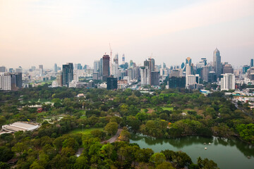Fototapeta na wymiar Beautiful aerial view of the skyline of Bangkok with Lumphini Park