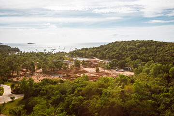 Top view of a tropical island, sea and forest in Vietnam