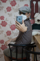 person man enjoying taking a selfie at the cafe.