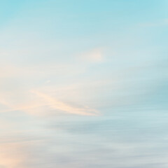 sunset background. sky with soft and blur pastel colored clouds. gradient cloud on the beach resort. nature. sunrise.  peaceful morning. Instagram toned style