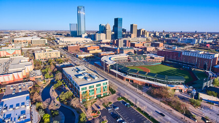 Beautiful aerial of morning light on downtown Oklahoma City and shopping area - obrazy, fototapety, plakaty