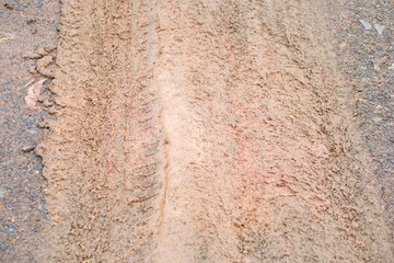 car wheel tracks on the road