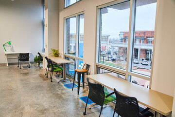 Coworking modern desk space against window