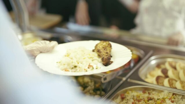 Cuisine cafeteria buffet with food.