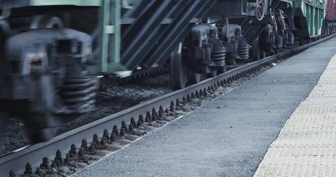 Close-up view of a train wheels. Railroad.