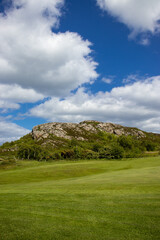 golf course with hill