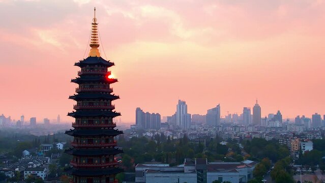 aerial view of wanfo old tower in midtown of jinhua at sunset
