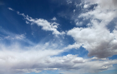 Beautiful landscape with blue sky the moving fluffy cumulus clouds