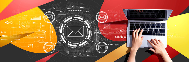 Email concept with person using a laptop computer
