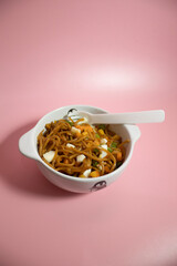 Fried noodle on bowl