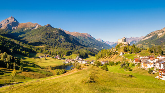 Mountains surrounding the village and castle of Tarasp (Grisons, Switzerland). It lies in the Lower Engadine Valley along the Inn River near Scuol. Tarasp Castle was built in the 11th century.