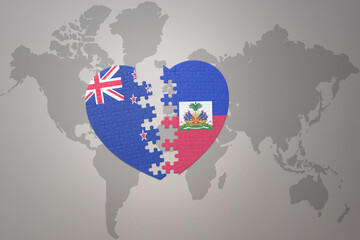 puzzle heart with the national flag of new zealand and haiti on a world map background. Concept.