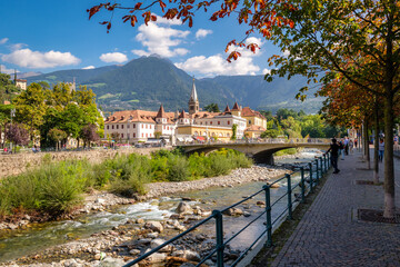 Merano (or Meran) is a city surrounded by mountains near Passeier Valley and Val Venosta (South Tyrol, Italy). The Passer river flows through Merano. It's a popular among famous artists and scientists - obrazy, fototapety, plakaty