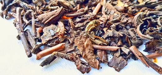 Roasted tea leaf on the white gray background. Camellia sinensis plant. Suitable for promotion of food and beverage industry and company.