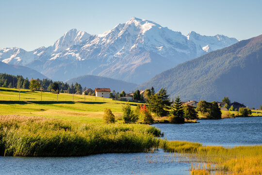 Past the Austria-Italy border and Reschen Pass, lies St. Valentin auf der Haide with its gorgeous Lake Haider and view on the Ortler Mountain Group. It lies in South Tyrol in Vinschgau or Val Venosta