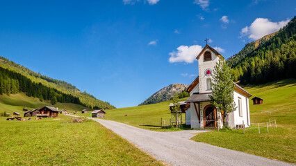 Pfundser Tschey is one of the most beautiful high valleys of Tyrol (Austria). The panorama with hay...