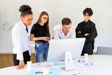 A multinational team is working on a new project in the office