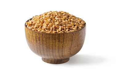 Wheat grain in wooden bowl isolated on a white background.